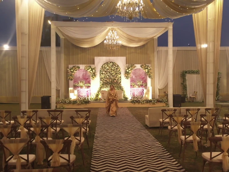 An assamese bride walking the aisle for a private event by pixxelmonk